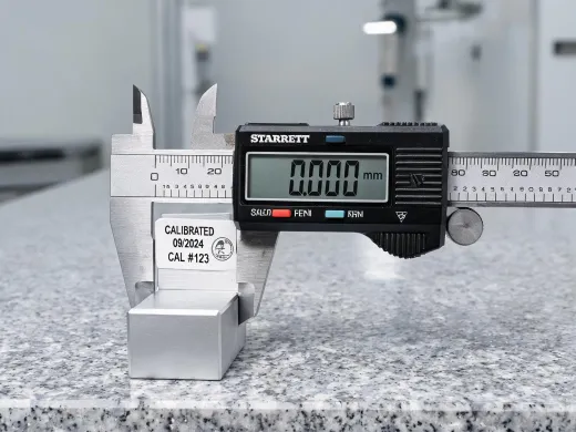 Digital caliper on a granite surface plate